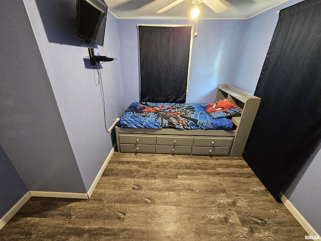 2409 9th St, Silvis, IL 61282 - bedroom with wood finished floors and ceiling fan