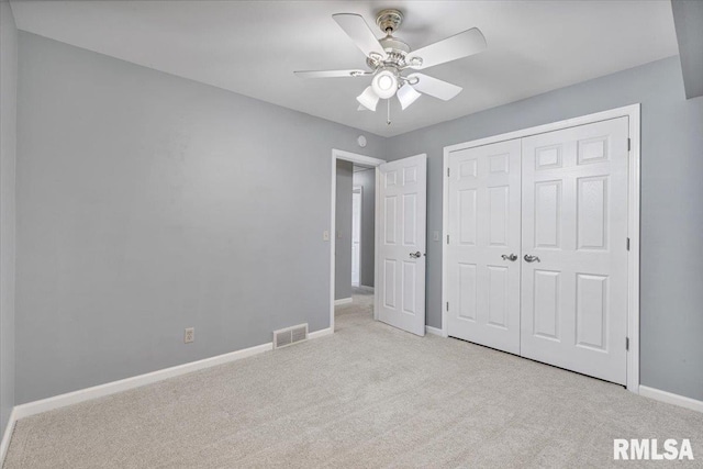 5315 34th Ave, Moline, IL 61265 - unfurnished bedroom with carpet, a closet, and ceiling fan