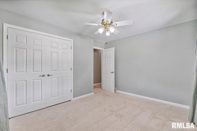 5315 34th Ave, Moline, IL 61265 - unfurnished bedroom with carpet flooring, a closet, and ceiling fan