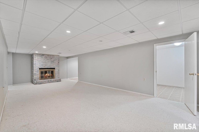 5315 34th Ave, Moline, IL 61265 - finished basement featuring carpet flooring, a brick fireplace, recessed lighting, and a drop ceiling