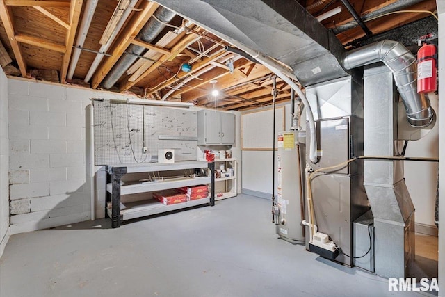 5315 34th Ave, Moline, IL 61265 - unfinished basement with a workshop area, water heater, and concrete block wall