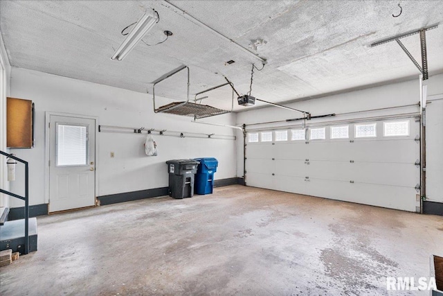 5315 34th Ave, Moline, IL 61265 - garage featuring a garage door opener