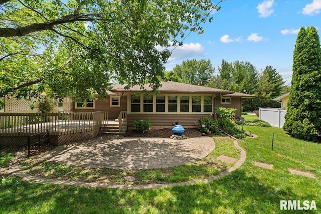5315 34th Ave, Moline, IL 61265 - back of house with a deck and a patio area