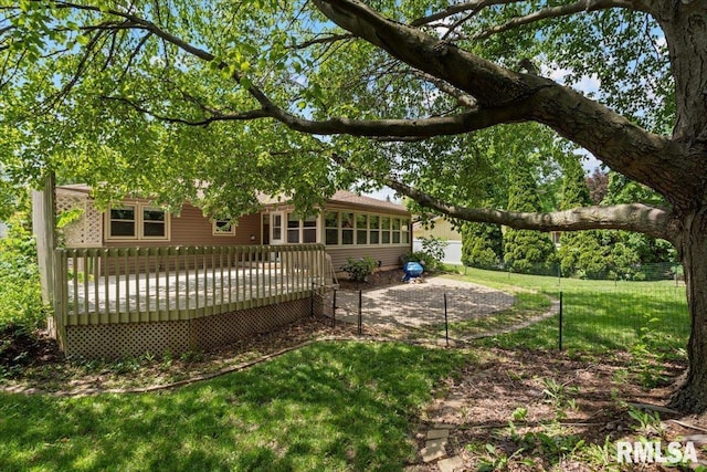 5315 34th Ave, Moline, IL 61265 - back of property with a lawn and a deck