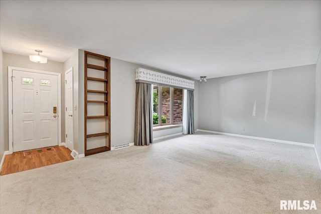 5315 34th Ave, Moline, IL 61265 - spare room with carpet and healthy amount of natural light