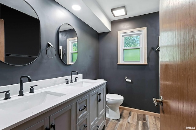 4345 Amesbury Dr, Bettendorf, IA 52722 - full bath featuring wood finished floors and double vanity
