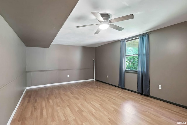 4345 Amesbury Dr, Bettendorf, IA 52722 - spare room with light wood-type flooring and a ceiling fan