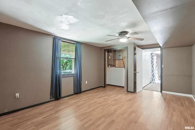 4345 Amesbury Dr, Bettendorf, IA 52722 - unfurnished room with light wood-type flooring and a ceiling fan