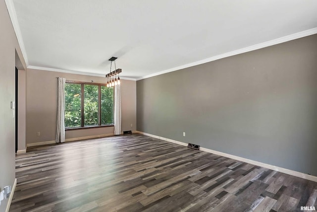 4345 Amesbury Dr, Bettendorf, IA 52722 - unfurnished room with ornamental molding and dark wood finished floors