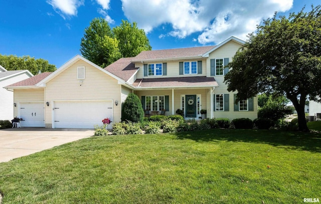 1200 Bridgeview Place, Le Claire, IA 52753 - view of front of house featuring a garage, concrete driveway, a front lawn, and a porch