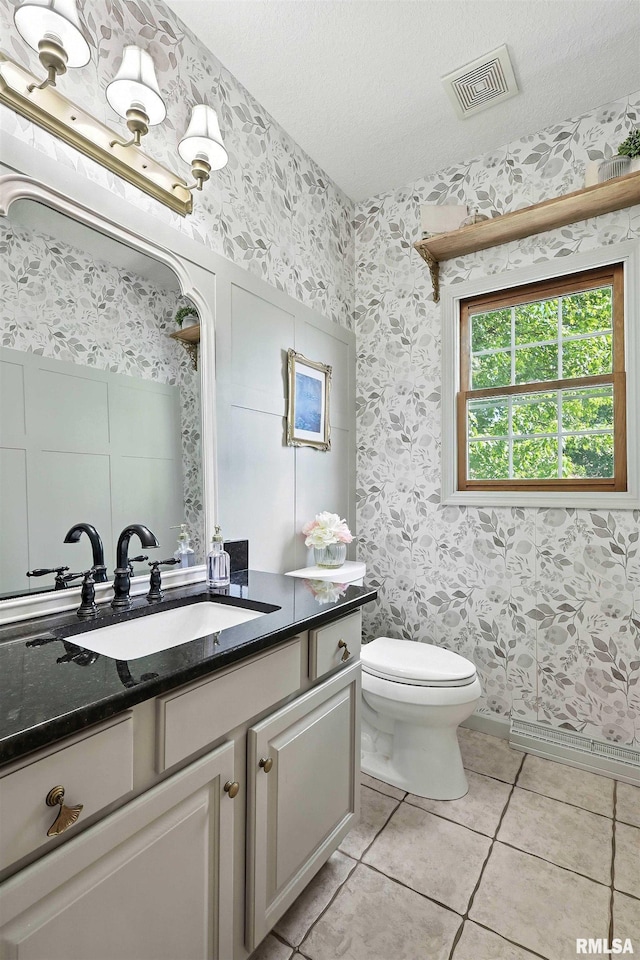 1200 Bridgeview Place, Le Claire, IA 52753 - bathroom with wallpapered walls, vanity, tile patterned floors, and a textured ceiling