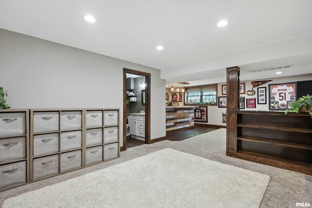 1200 Bridgeview Place, Le Claire, IA 52753 - carpeted living room with recessed lighting and baseboards