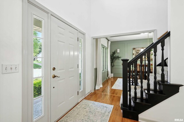 1200 Bridgeview Place, Le Claire, IA 52753 - foyer entrance featuring wood finished floors and stairway