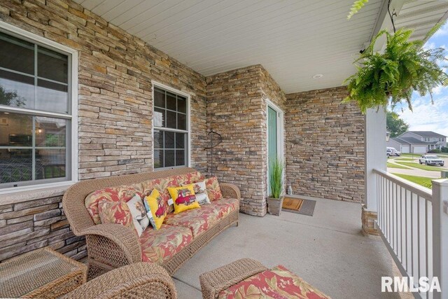 1100 Wild W Dr, Le Claire, IA 52753 - view of covered porch