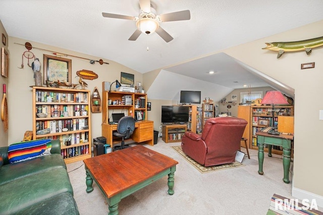 1100 Wild W Dr, Le Claire, IA 52753 - living area with vaulted ceiling, ceiling fan, and carpet floors
