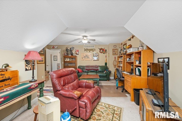 1100 Wild W Dr, Le Claire, IA 52753 - living room with a textured ceiling, ceiling fan, and carpet