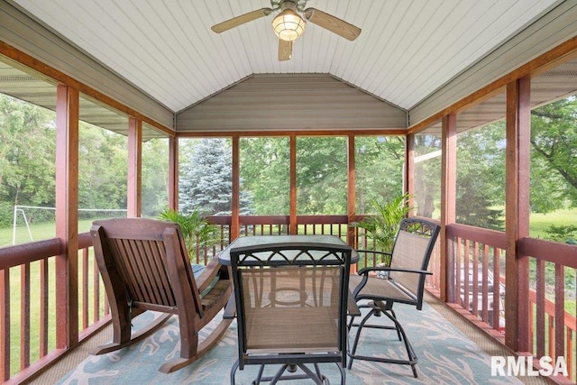 1100 Wild W Dr, Le Claire, IA 52753 - sunroom with a ceiling fan, vaulted ceiling, and outdoor dining space