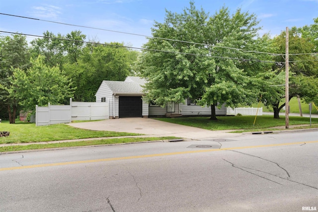 612 Waverly Rd, Davenport, IA 52804 - obstructed view of property with concrete driveway and an attached garage