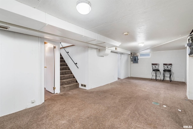 612 Waverly Rd, Davenport, IA 52804 - basement with carpet floors, electric panel, and stairway