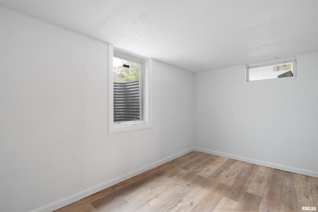 612 Waverly Rd, Davenport, IA 52804 - unfurnished room with light wood finished floors and baseboards