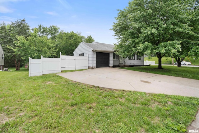 612 Waverly Rd, Davenport, IA 52804 - view of yard with an attached garage and driveway