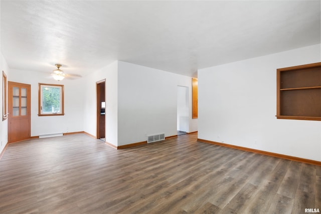 612 Waverly Rd, Davenport, IA 52804 - unfurnished living room with wood finished floors and a ceiling fan