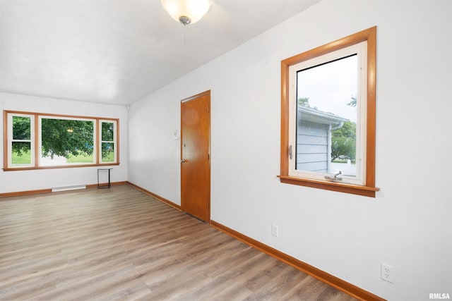 612 Waverly Rd, Davenport, IA 52804 - empty room with plenty of natural light and light wood-type flooring