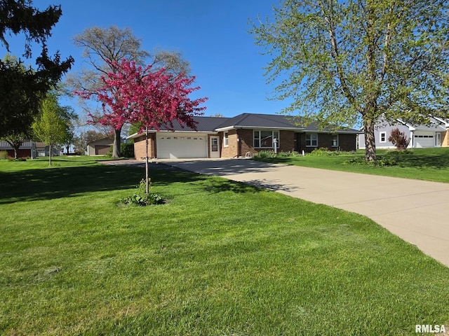 206 E 13th St, Tipton, IA 52772 - ranch-style home with a garage, concrete driveway, a front lawn, and brick siding