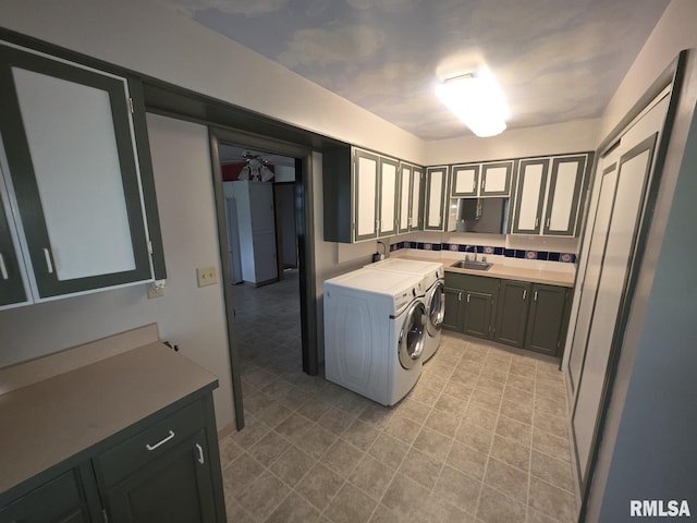 206 E 13th St, Tipton, IA 52772 - laundry area featuring washer and clothes dryer and light tile patterned floors
