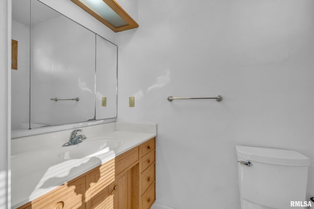 206 E 13th St, Tipton, IA 52772 - bathroom with toilet and vanity