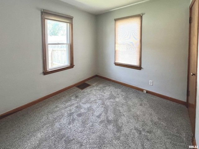 1130 53rd St, Moline, IL 61265 - carpeted empty room with baseboards
