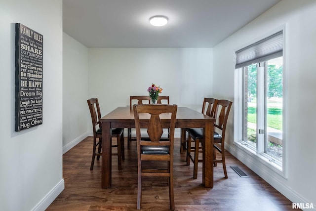 901 E Gregory Ave, Marion, IL 62959 - dining area featuring healthy amount of natural light and wood finished floors