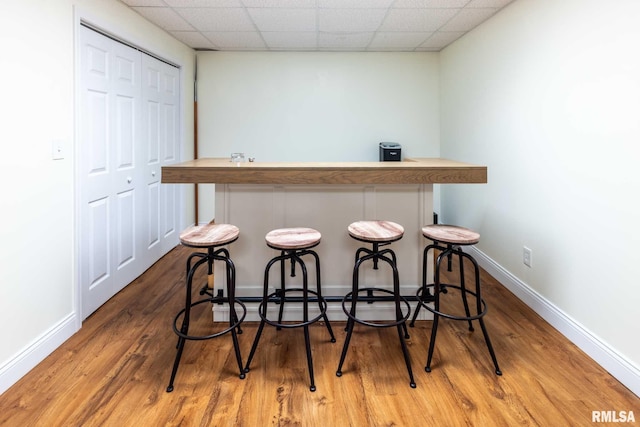 901 E Gregory Ave, Marion, IL 62959 - indoor dry bar featuring a drop ceiling and wood finished floors