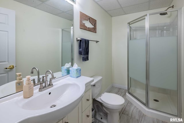 901 E Gregory Ave, Marion, IL 62959 - bathroom with a paneled ceiling, a stall shower, and vanity