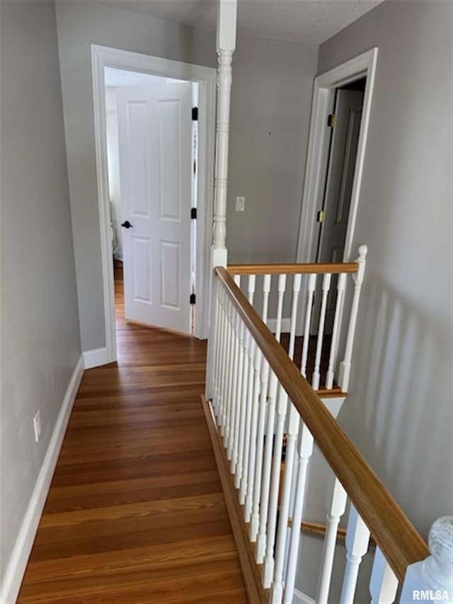 3119 15th St Unit C, Moline, IL 61265 - corridor featuring an upstairs landing and wood finished floors