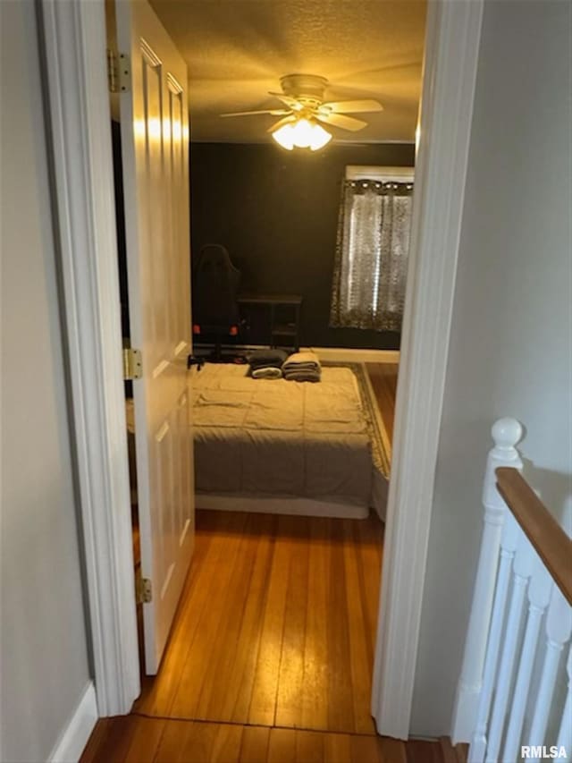 3119 15th St Unit C, Moline, IL 61265 - bedroom featuring wood-type flooring and ceiling fan