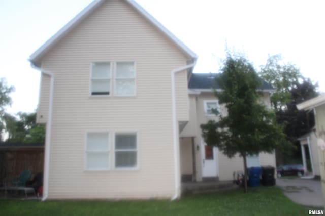 3119 15th St Unit C, Moline, IL 61265 - rear view of property with a lawn