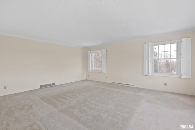 3 Brown Ct, Bettendorf, IA 52722 - spare room featuring crown molding, carpet floors, and a baseboard radiator