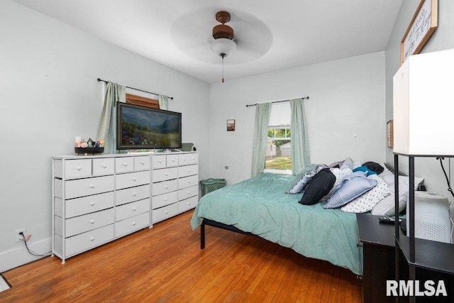 1620 24th St, Moline, IL 61265 - bedroom featuring wood finished floors and ceiling fan