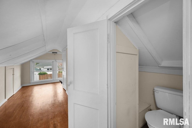 1620 24th St, Moline, IL 61265 - bathroom featuring vaulted ceiling and wood finished floors