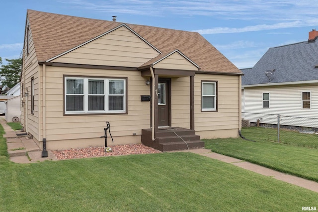 419 50th St, Moline, IL 61265 - bungalow-style home featuring roof with shingles