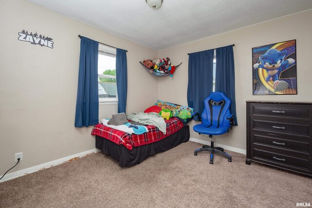 419 50th St, Moline, IL 61265 - carpeted bedroom featuring baseboards