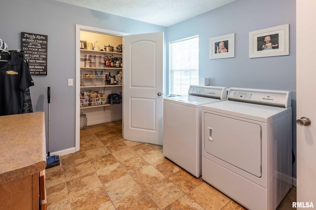 4182 Baptist Camp Rd, Carterville, IL 62918 - laundry room featuring washing machine and dryer and light stone finish floors
