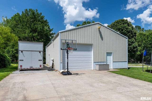 4182 Baptist Camp Rd, Carterville, IL 62918 - view of outdoor structure featuring concrete driveway