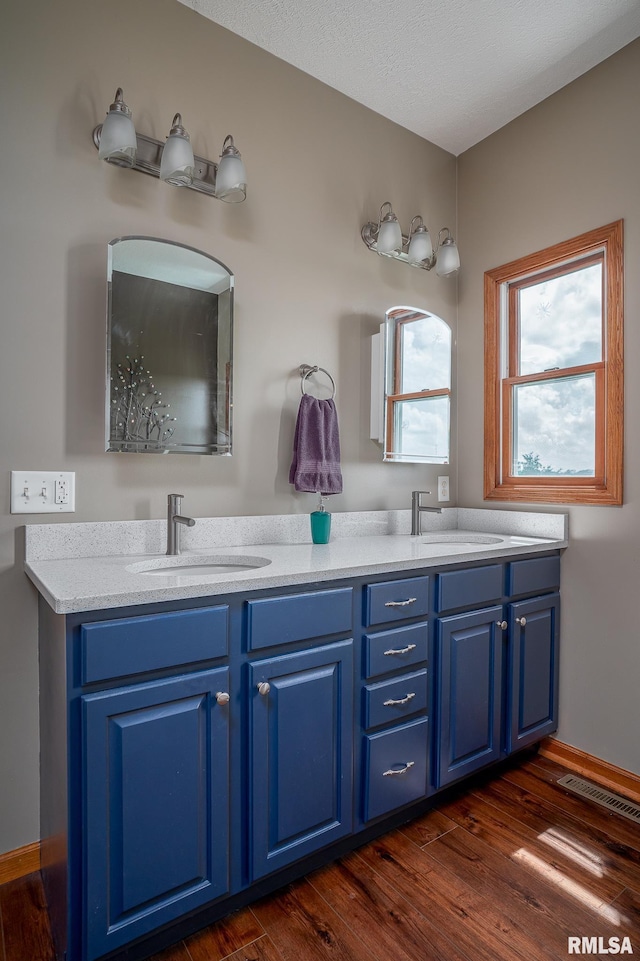 27062 238th St, Le Claire, IA 52753 - full bath with double vanity and wood finished floors