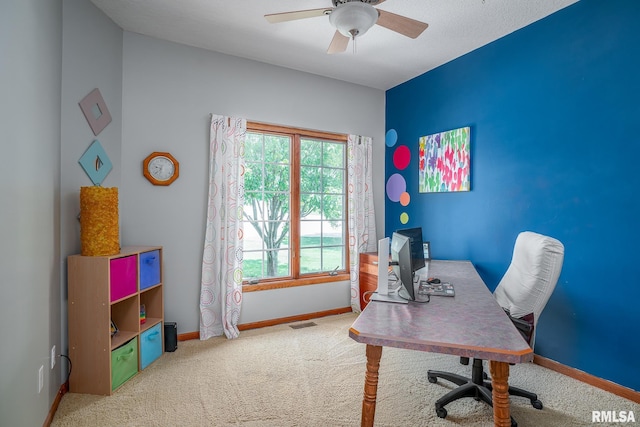 27062 238th St, Le Claire, IA 52753 - carpeted office space featuring baseboards and a ceiling fan