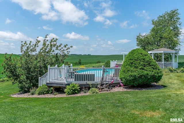 27062 238th St, Le Claire, IA 52753 - outdoor pool with a yard and a wooden deck