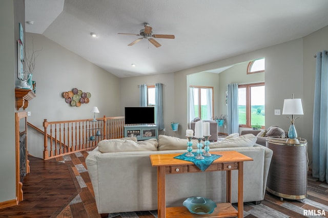 27062 238th St, Le Claire, IA 52753 - living room featuring lofted ceiling, a ceiling fan, plenty of natural light, and wood finished floors