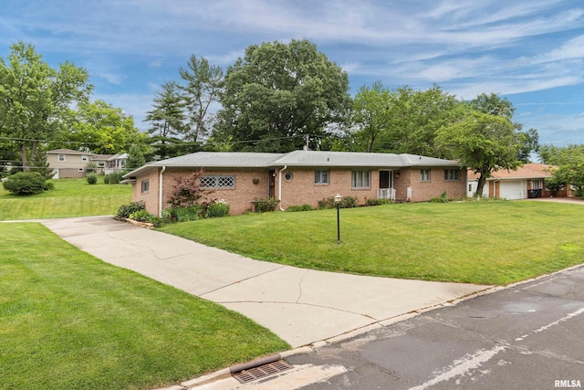 1427 35th Ave, Rock Island, IL 61201 - ranch-style home featuring a front yard and brick siding
