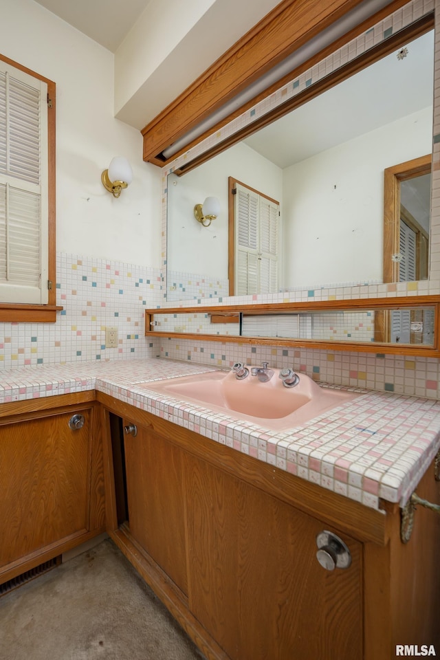 1427 35th Ave, Rock Island, IL 61201 - bathroom with backsplash and vanity